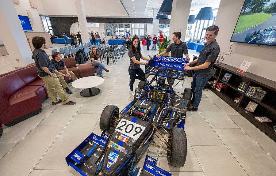 Swanson School of Engineering students show off the formula-style race car they design, build, and compete with against other schools.