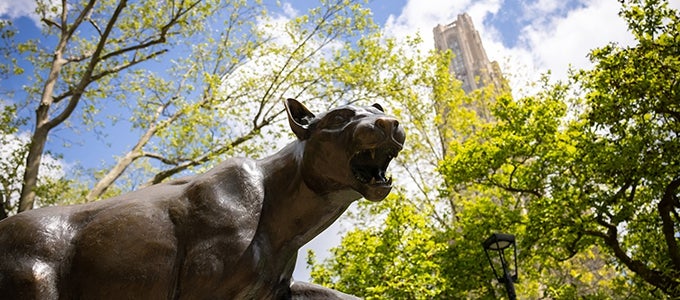 panther statue with Cathedral of Learning in background