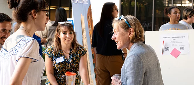 Provost Cudd meeting with students at Graduate Student Orientation resource fair