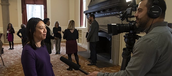 faculty members being interviewed on camera