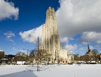 cathedral of learning with snow