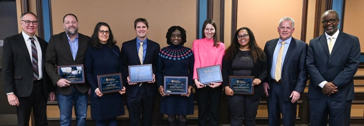 2023 Provost Award for Diversity in the Curriculum recipients pose with plaques