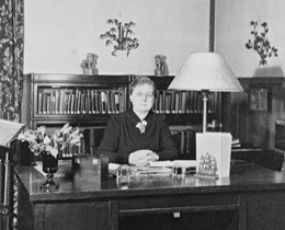 Dean Amos at her desk